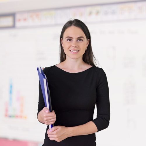 portrait-of-young-smiling-female-teacher-at-school-2023-11-27-04-55-18-utc-v1-min.jpg